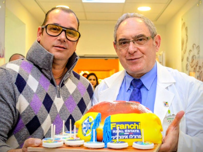 Professor Joseph Press, Director of Schneider Children’s Medical Center with Marchello Enchilini at Hanukkah